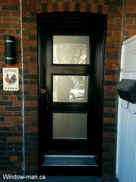 Modern front door ideas. Single front entry steel insulated black. Current shaker style black popular. Acid etched glass sandblasted glasses. Dorothy retro collection shaker style
